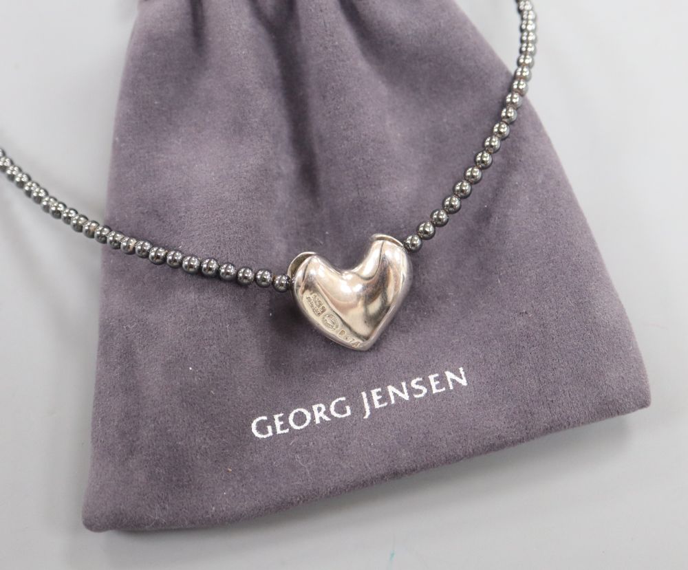 Allan Scharff for Georg Jensen, a sterling silver heart pendant on hematite bead necklace,